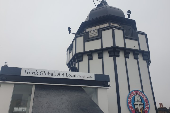 a sign on the side of a building