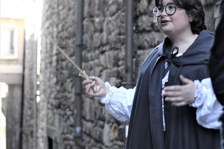 a person standing in front of a building