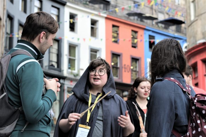 a group of people standing in front of a building