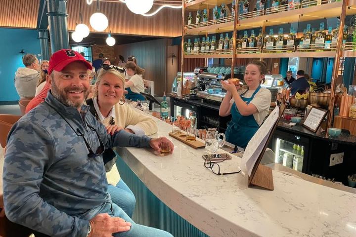 a group of people sitting at a table in a restaurant