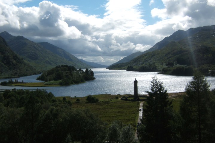 a view of a body of water with a mountain in the background