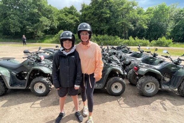 a man standing in front of a truck