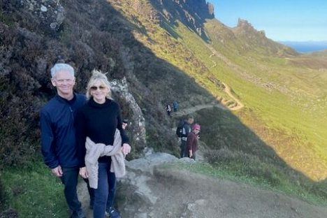 a group of people on a mountain road