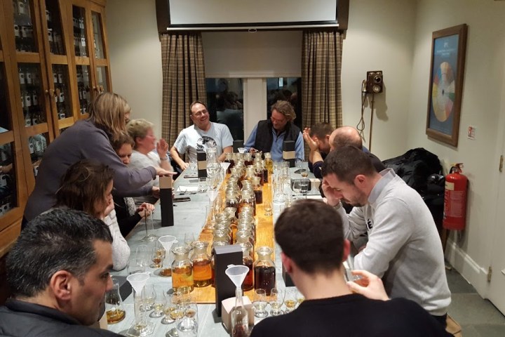 a group of people sitting at a table