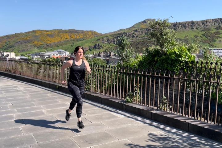 a person walking across a bridge