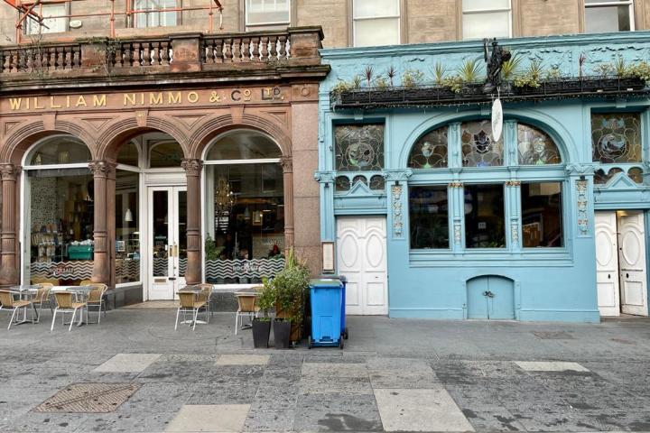 a bench in front of a building