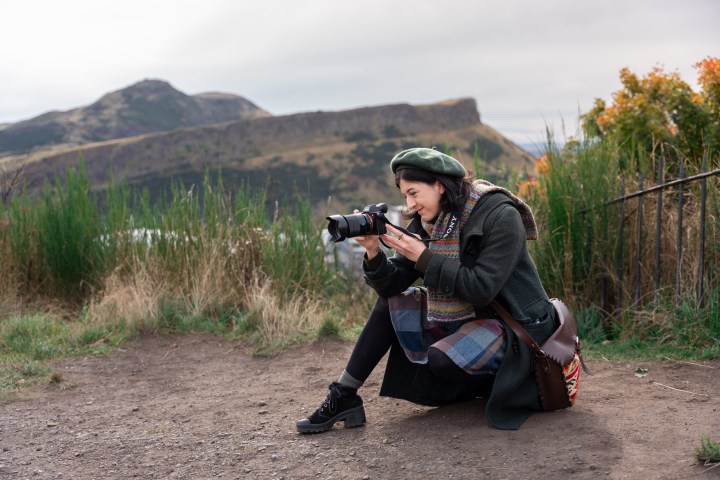 a little boy that is standing in the dirt