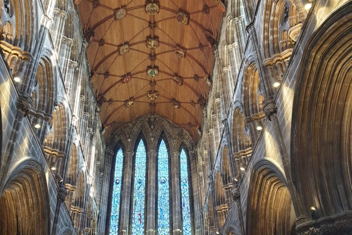 a building with a metal fence