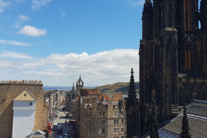 a large clock tower towering over a city