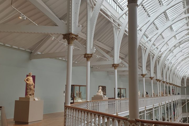 a building with a metal fence