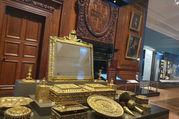 a cake sitting on top of a counter next to a fireplace