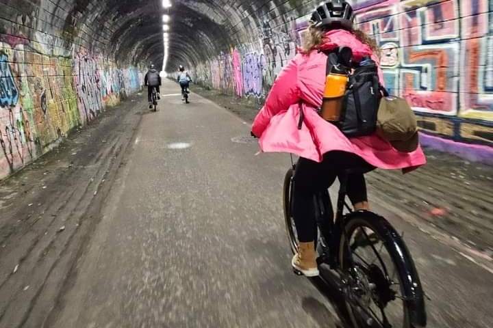 a person riding on the back of a motorcycle